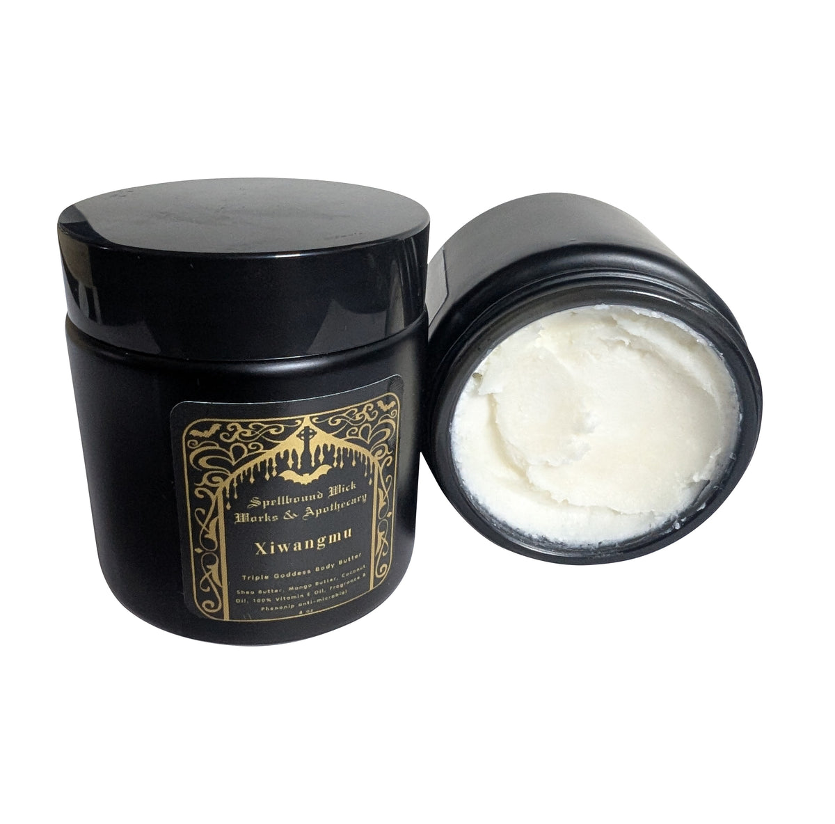 Open black jar of whipped white body butter with the black lid resting behind it on a white background.
