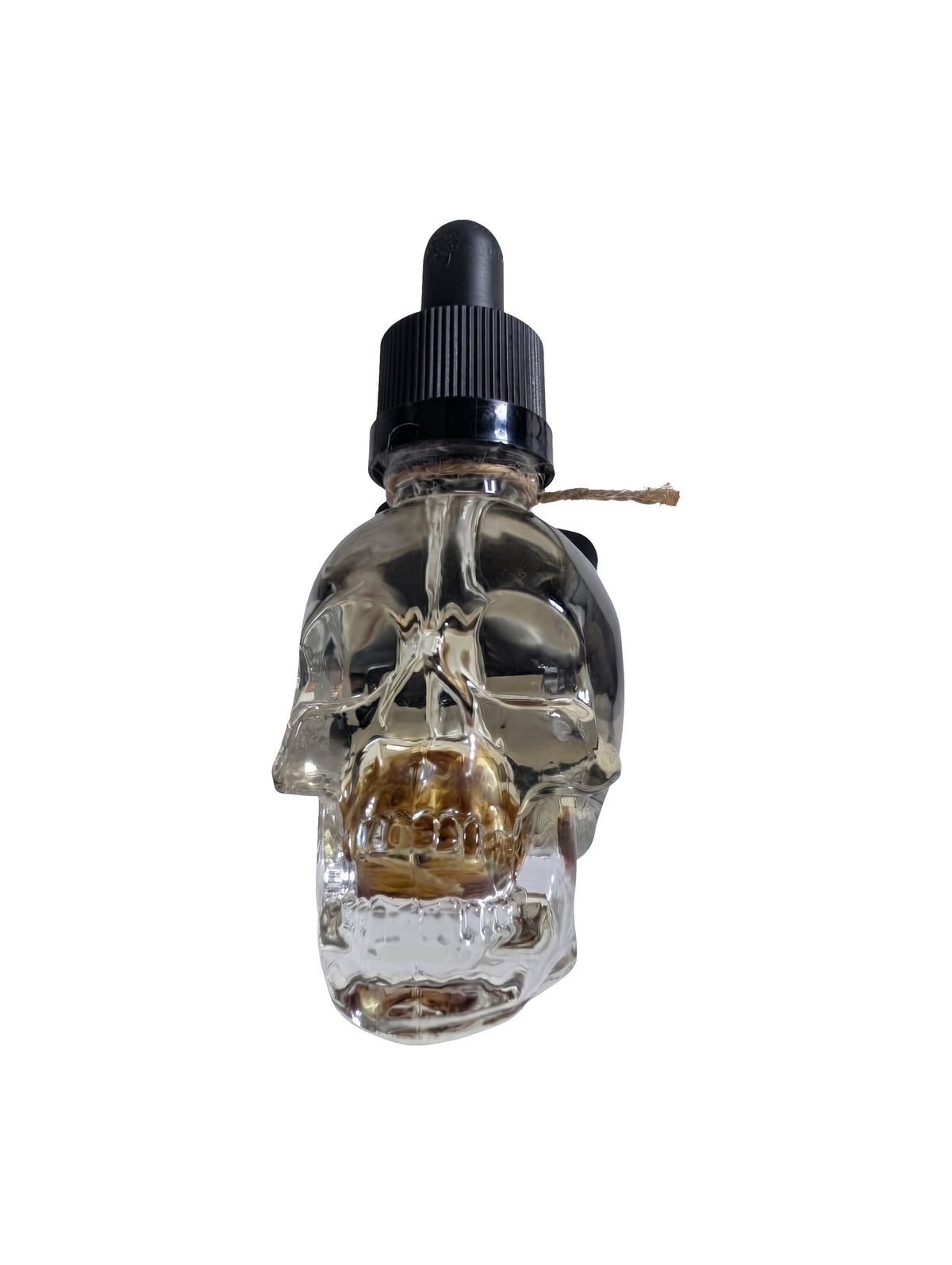 Clear skull shaped glass bottle of Maiden body oil with black dropper top, shown on a white background.