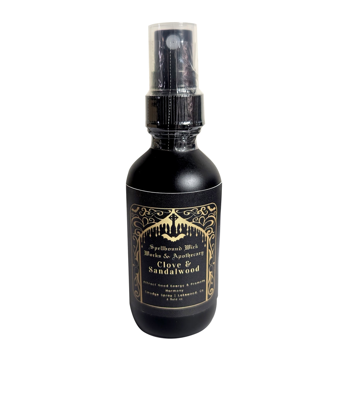 Single matte black spray bottle standing upright on a white background with the gold label centered.
