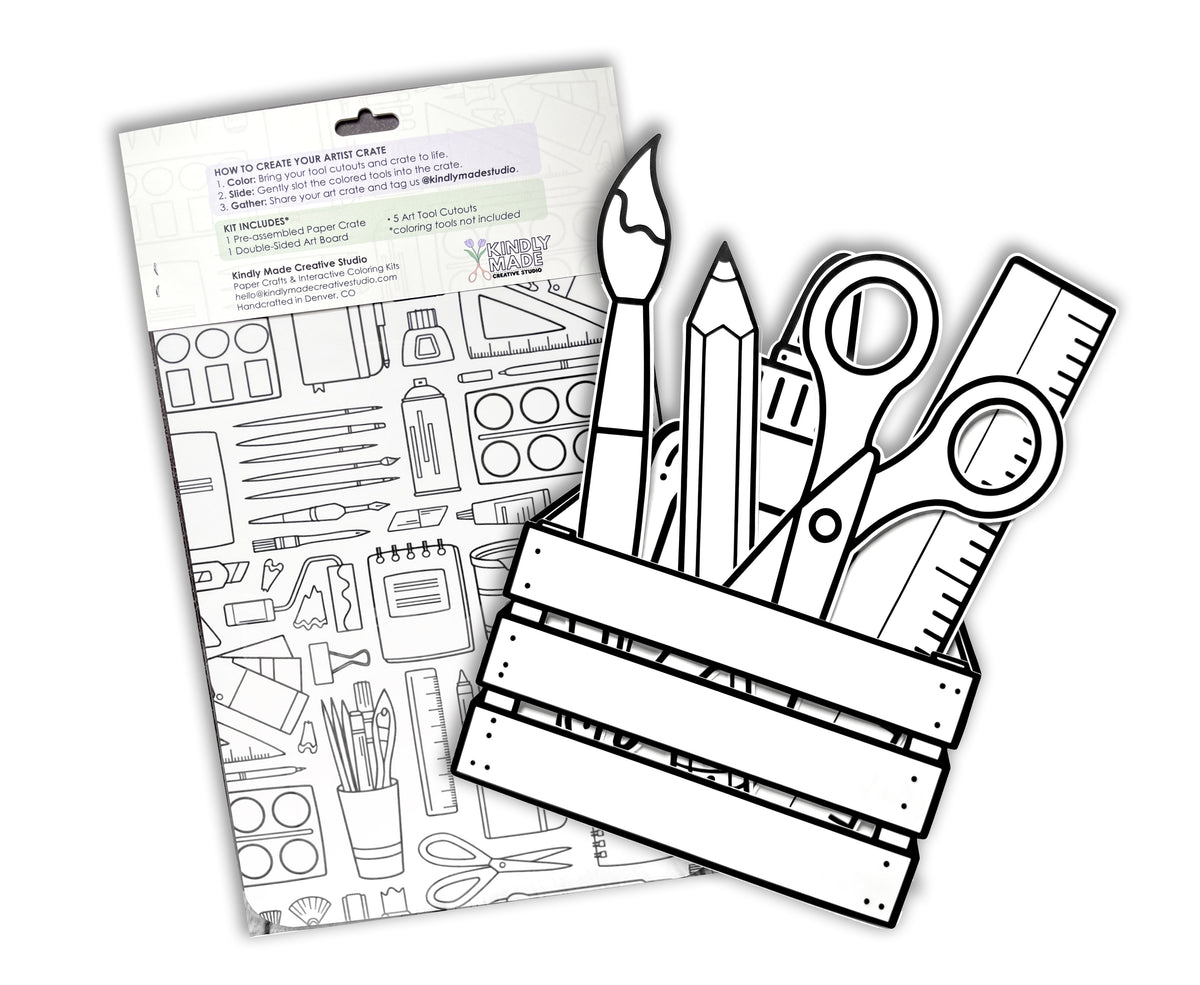 Back of the Art Crate kit on a white background, showing the instructions, the art board of art supply drawings and the assembled crate with its cutouts.