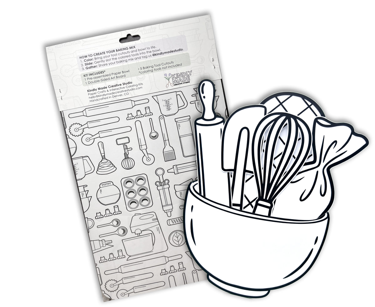 Back of the Baking Mix kit on a white background, showing the instructions, the art board of baking tool drawings and the assembled bowl with its cutouts.