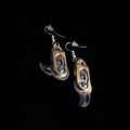 Gear pocket knife earrings by Pocket & Bear Collective on a black background with both stainless steel blades swung open