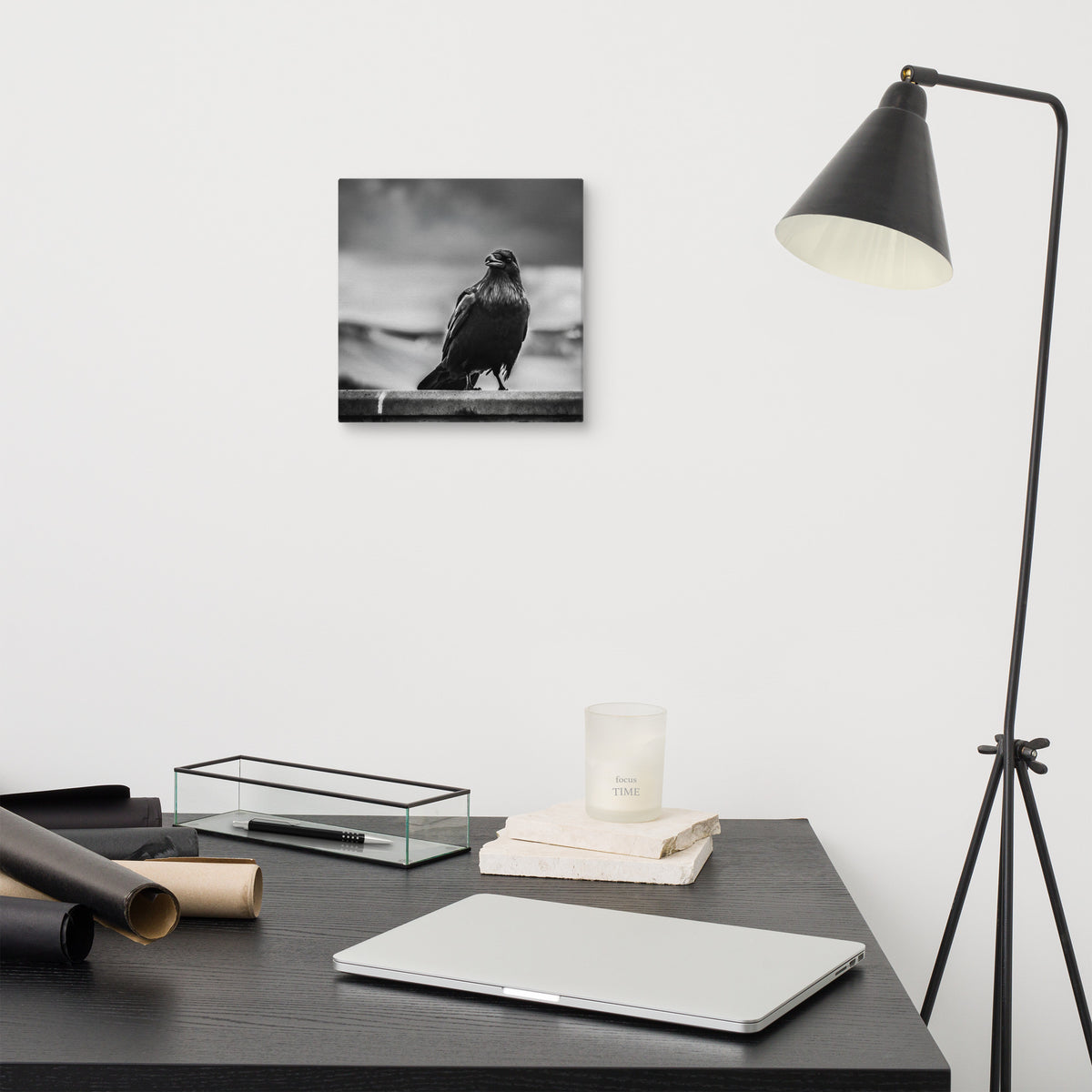 Crow So Chic canvas print by Iain Camacho, small canvas hanging above a desk next to a black floor lamp