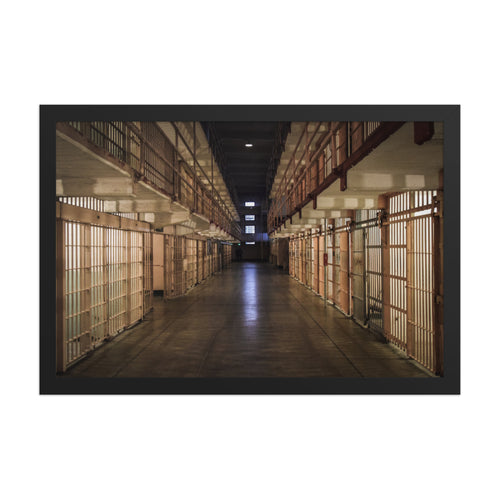 Alcatraz, San Francisco framed luster print by iain, front view of the black framed print showing rows of cells and the dark center aisle