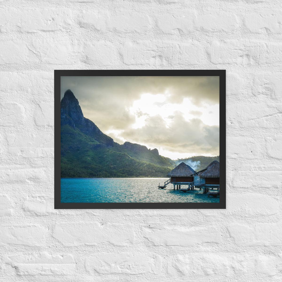 Bora Bora, French Polynesia framed luster print by iain, black framed print hanging on a white brick wall