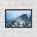 Colorado Mountain framed luster print by iain, black framed print hanging on a white brick wall