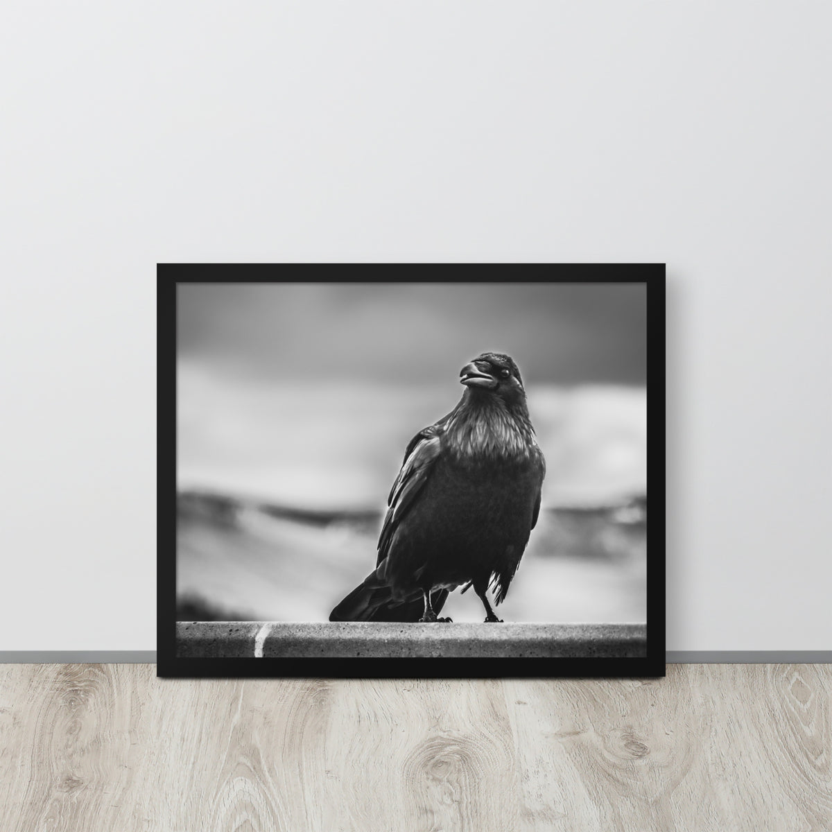 Crow So Chic framed luster print by iain, black framed print resting on a light wood floor against a white wall