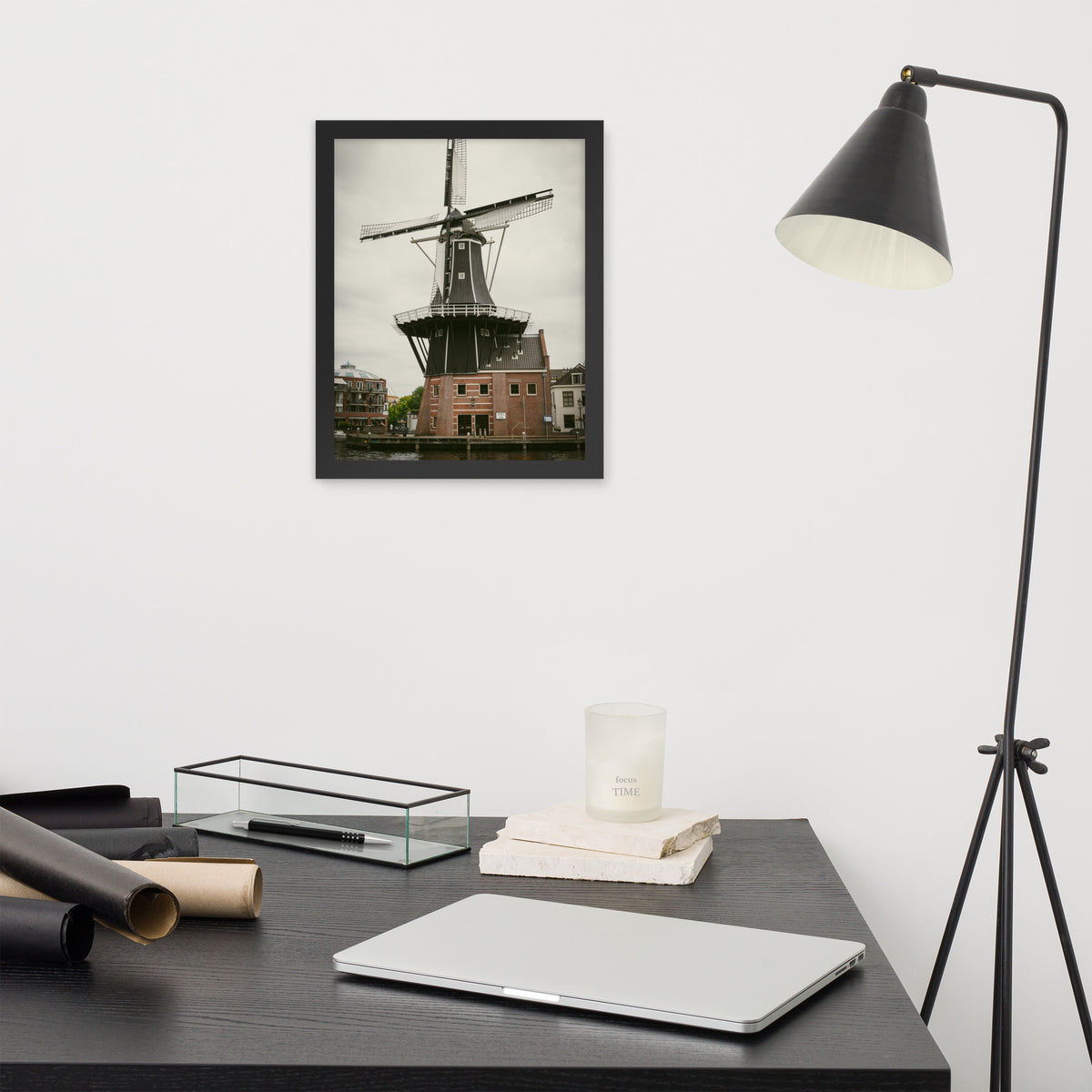 De Adriaan, Haarlem framed luster print by iain, black framed print hanging above a desk next to a black floor lamp