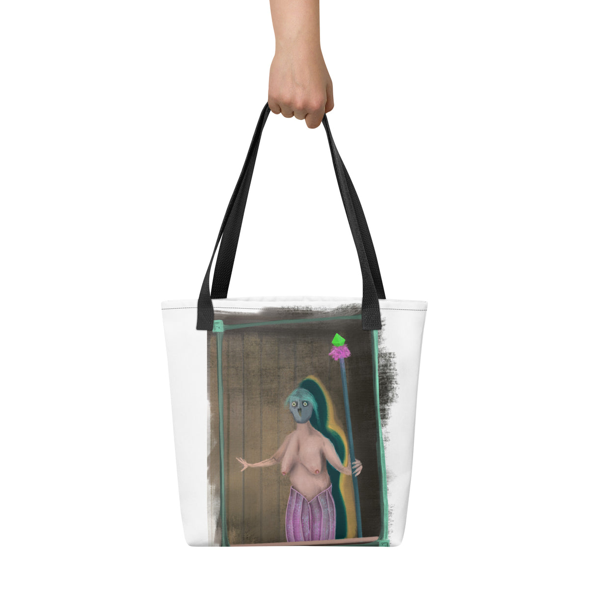 A hand holding The Sitting Room Framed Daemon tote bag by Fish by its handles