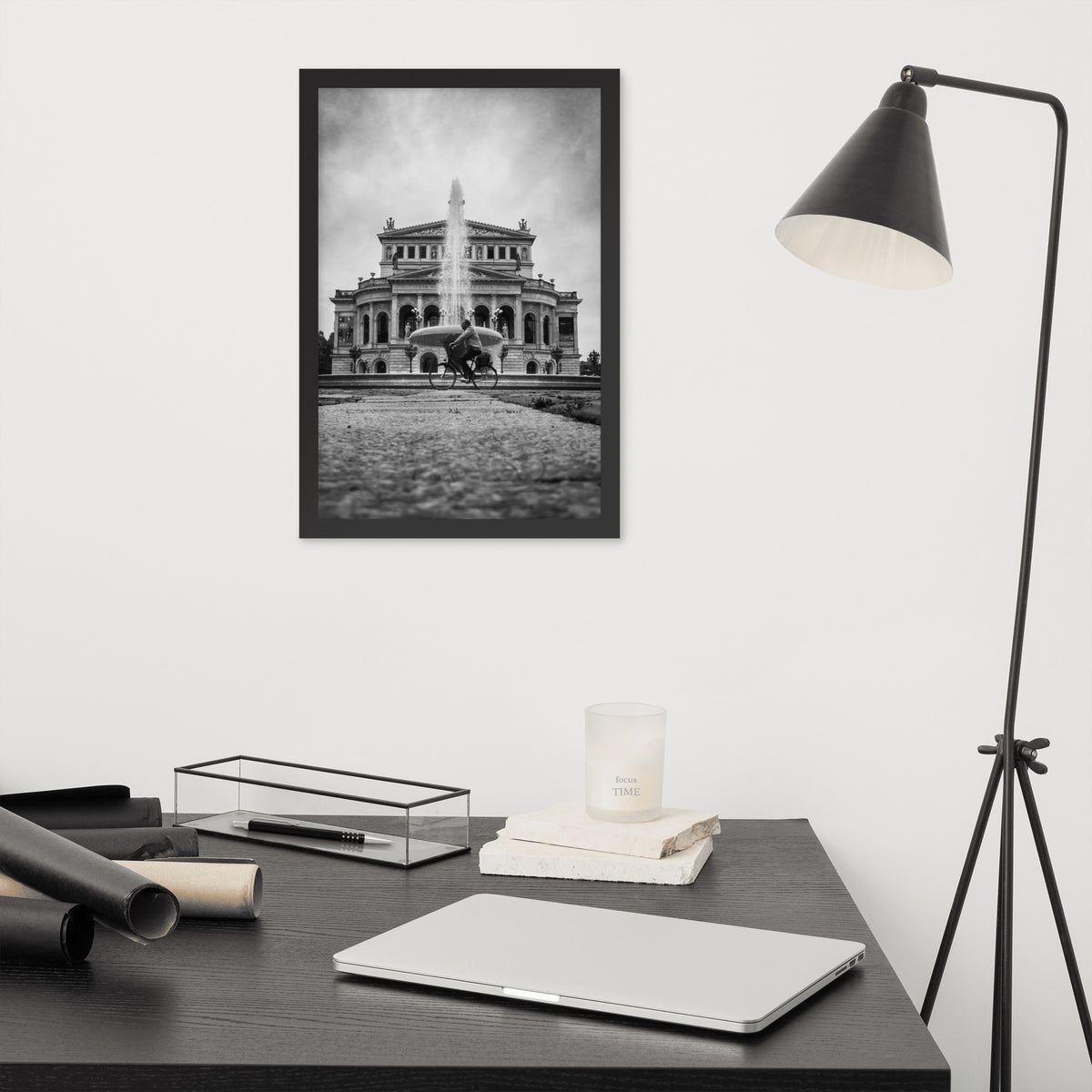 German Precision framed luster print by iain, black framed print hanging above a desk next to a black floor lamp