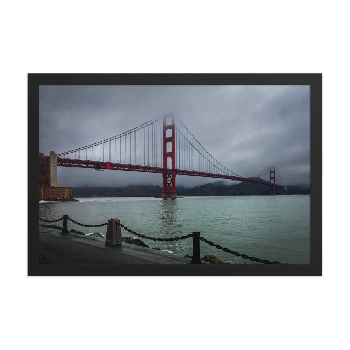 Golden Gate Bridge, San Francisco framed luster print by iain, front view of the black framed print with a chain railing in the foreground
