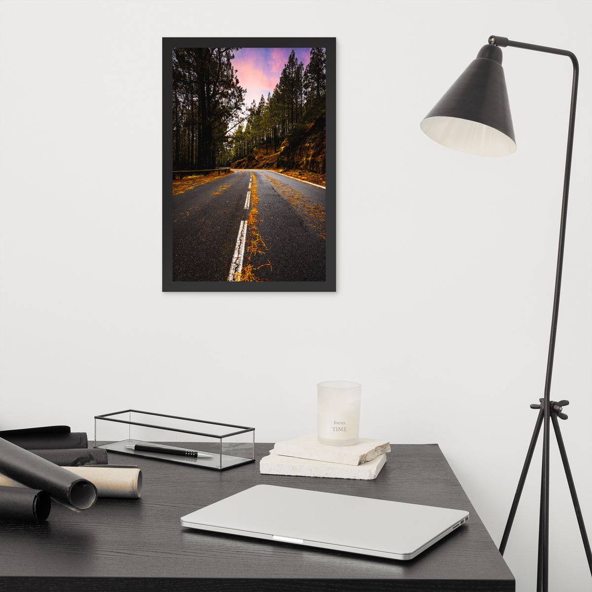 Mountain Road framed luster print by iain, black framed print hanging above a desk next to a black floor lamp