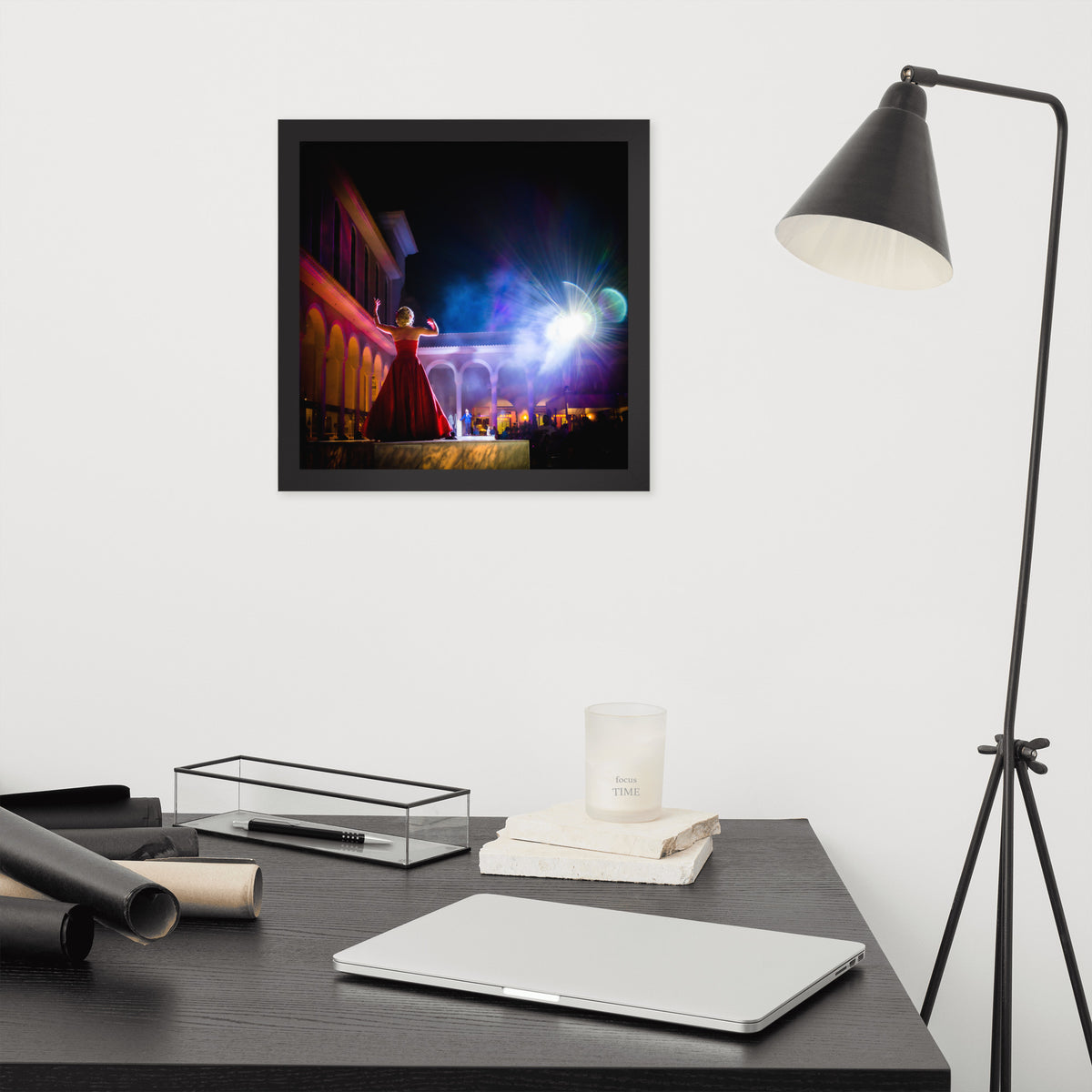 Perform for the Gods framed luster print by iain, square black framed print hanging above a desk next to a black floor lamp