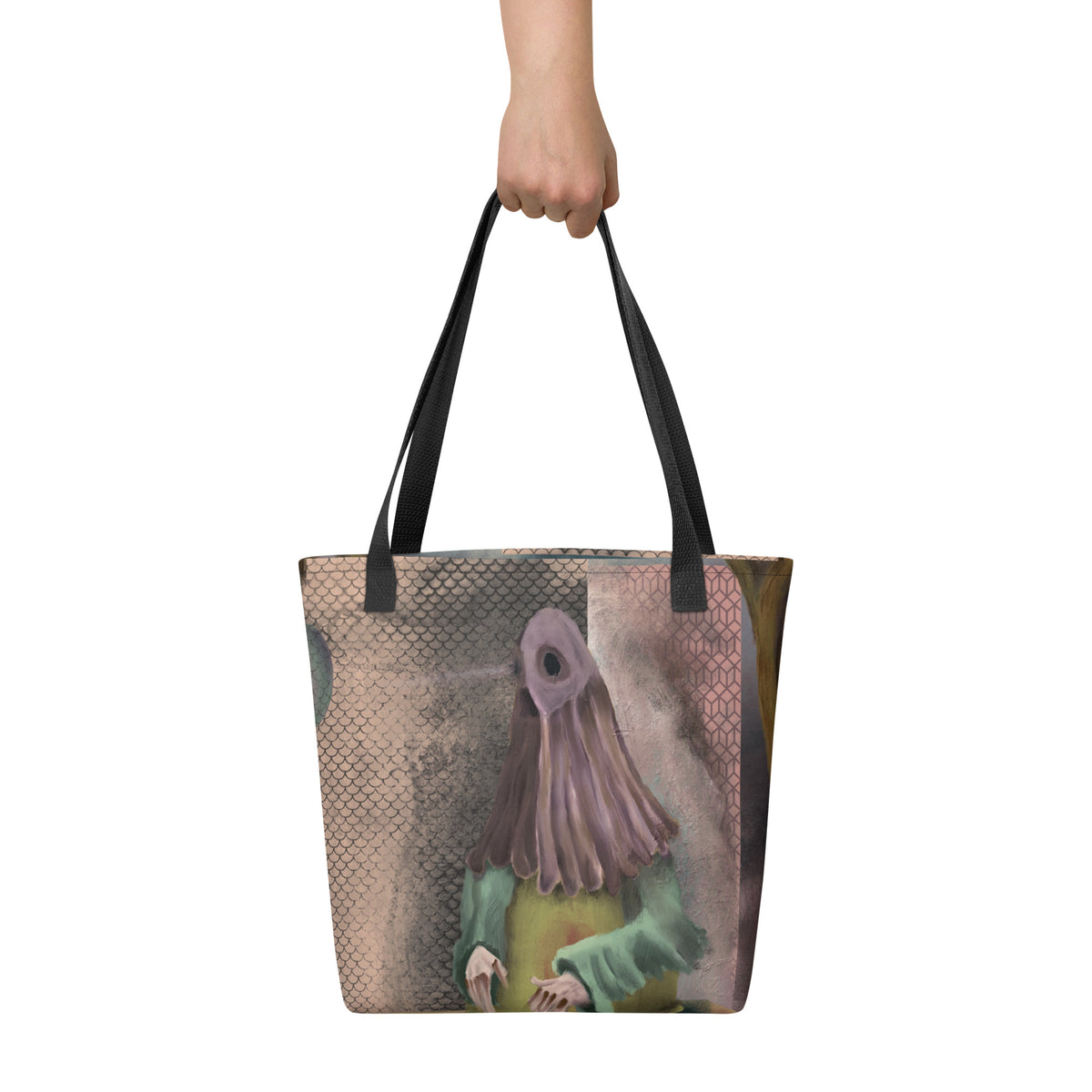 White tote bag held up by a hand against a neutral background, displaying the scale and vertical placement of the front graphic.