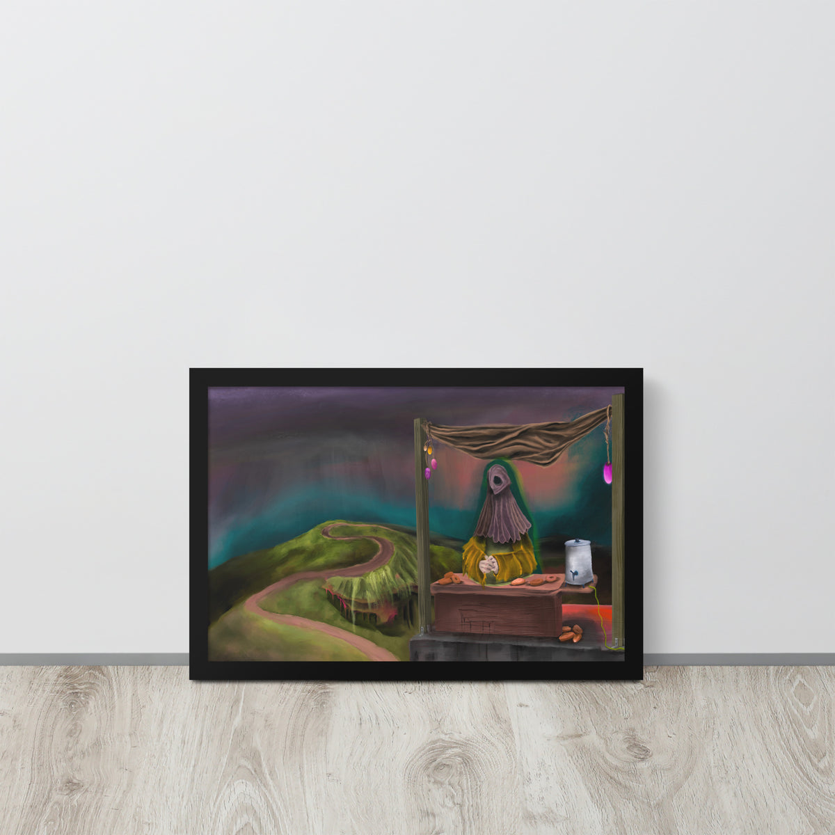 The Void Has Snacks framed luster print leaning against a white wall on a light wood floor