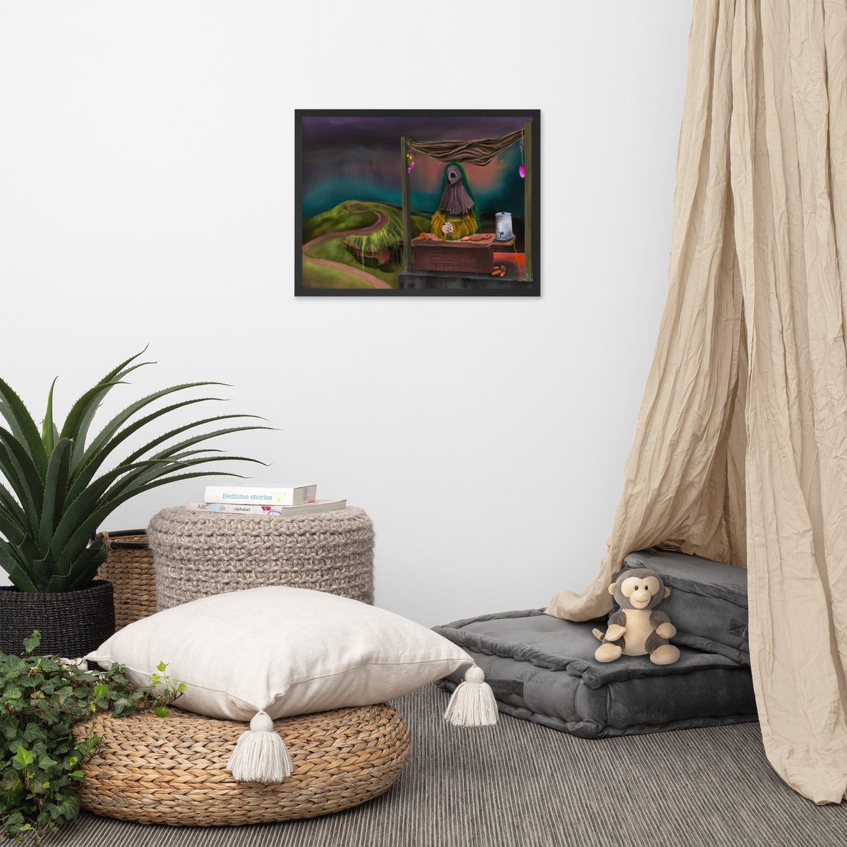 The Void Has Snacks framed luster print hanging above a woven basket and floor cushion with a curtain at the edge of the frame