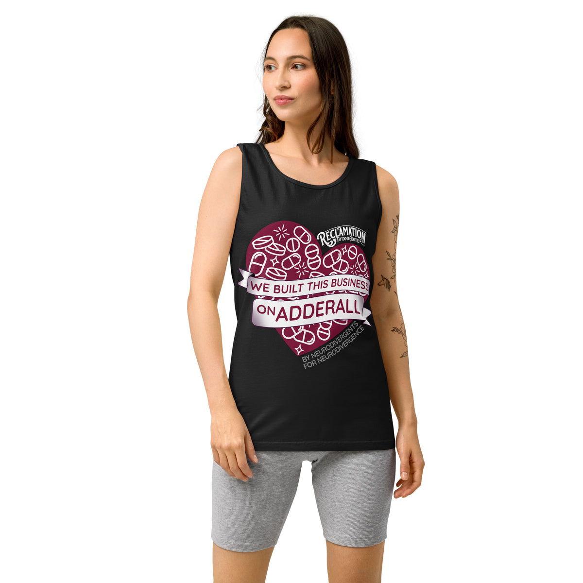We Built This Business On Adderall tank top in black worn by a model, front view with the pill-filled heart across the chest