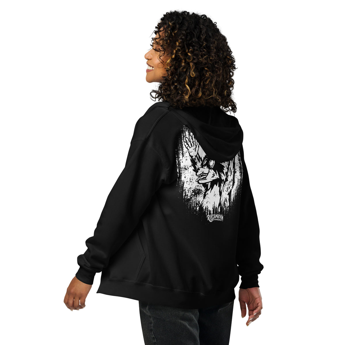 Model wearing the Cornelius Baphomet zip hoodie in black, turned to show Cornelius the horned raccoon printed large across the back
