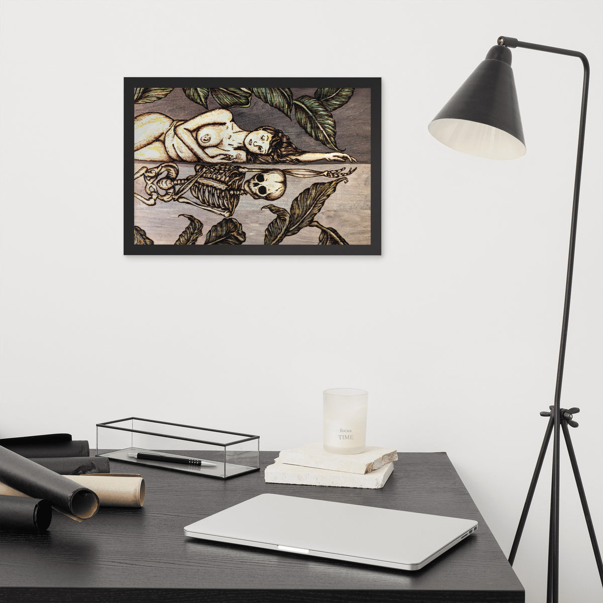 Vainglorious Contrition framed luster print by Cami Thunder, black framed print hanging above a desk next to a black floor lamp