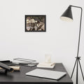 Vainglorious Contrition framed luster print by Cami Thunder, smaller black framed print hanging above a desk next to a black floor lamp